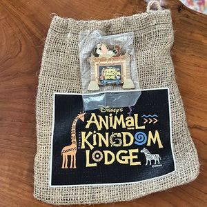 Disney’s Animal Kingdom Lodge 10th Anniversary Trading Pin and burlap bag